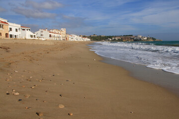 Fototapeta na wymiar Altafulla beach and residential area on the shore facing the Mediterranean Sea. Tarragona