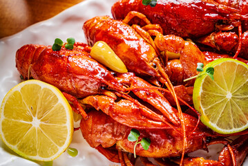Crayfish. Red boiled crawfishes on table in rustic style
