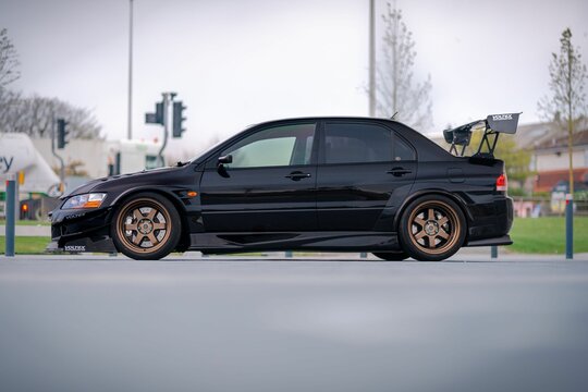 Side view of a tuned black Mitsubishi Evo 9 GT