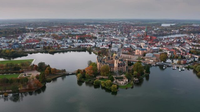 Aerial autumn skyline view of beautiful Schwerin Palace Castle (German: Schweriner Schloss) in Mecklenburg-Vorpommern, Germany