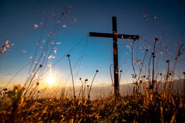 cross in the sunset time