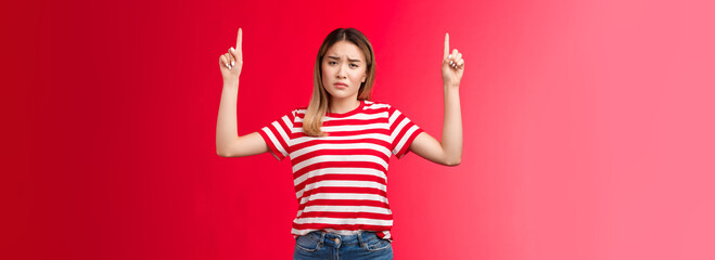 Upset clingy girlfriend complaining frowning sad, disappointed point fingers up whining, making complaint stand striped t-shirt red background jealous friend eating tasty ice cream, wanna try too - obrazy, fototapety, plakaty