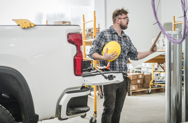 Construction Supervisor Checking the Punch List © Tomasz Zajda