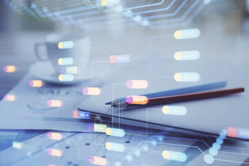 Double exposure of table with computer on background and data theme hologram. Data technology concept.