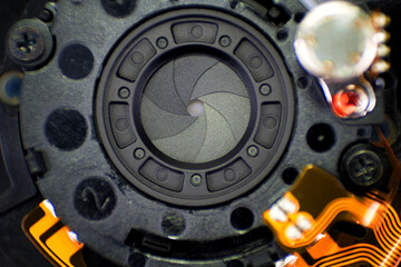 Objective aperture blades mechanism, camera lens aperture and electronic connection close up macro...