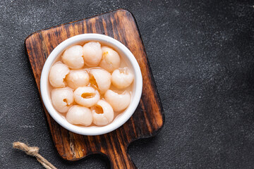 lychee canned fruit fresh delicious snack healthy meal food snack diet on the table copy space food...