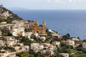 Fototapeta na wymiar Touristic Town, Vettica Maggiore, on Rocky Cliffs and Mountain Landscape by the Tyrrhenian Sea. Amalfi Coast, Italy.