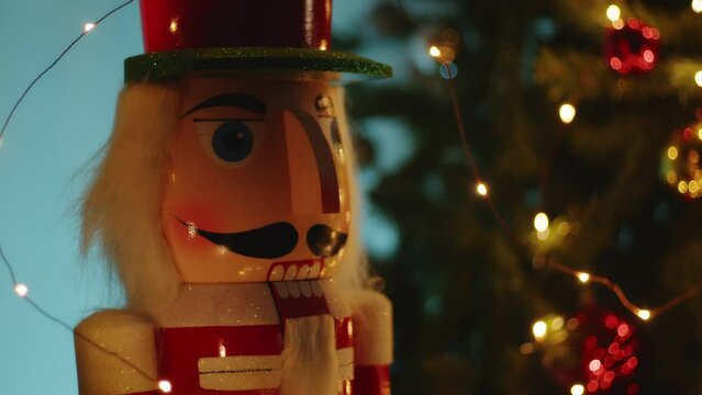 Toy Nutcracker Near the Christmas tree