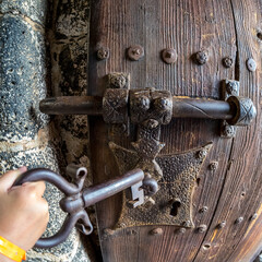 Antique door and giant door key. Fisheye lenses.