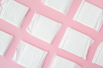 Many sanitary napkin on pink background