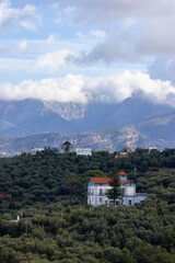 Residential Homes on top of Mountain by the Sea. Near Touristic Town of Sorrento, Italy. Cloudy Day.