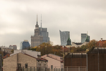 Panoramic view on the Palace of Culture and Science and modern skyscrapers in Warsaw city, Poland in autumn. Tourism.