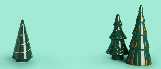 Beautiful ceramic Christmas trees on turquoise background with space for text