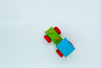 children's favorite toys: wooden trains. close-up of a wooden toy train on a white background. Wooden toys. Trains