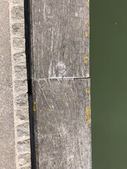 Wooden plank on pier in harbour
