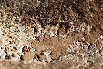 Rust, rusty pipe and peeling paint over time, selective focus.