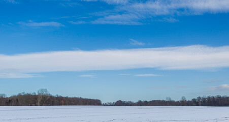 snow-covered meadows and trees on a winter day. Winter landscapes. Winter and nature. Gronau, Germany