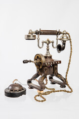 Old telephone isolated white background