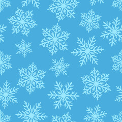 Light snowflakes on a blue background. Seamless winter pattern. Clipping. Christmas, New year. Suit for wrapping paper, packaging.