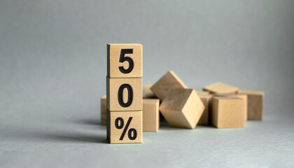 The inscription 50 percent on wooden cubes isolated on a light background, the concept of business and finance.