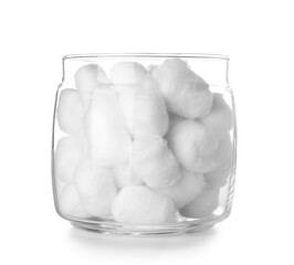 Glass jar of cotton balls on white background