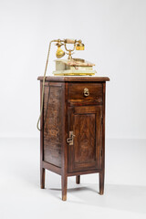 Old telephone isolated white background