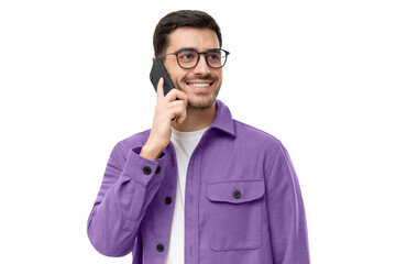 Portrait of handsome young man in purple shirt and glasses, answering phone call, looking aside...