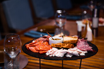 Delicious, beautiful slicing, appetizer on the table in a restaurant