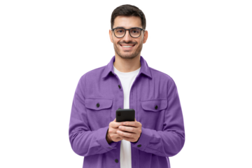 Young modern man in casual purple shirt and glasses, holding smart phone in hands, looking at camera with smile