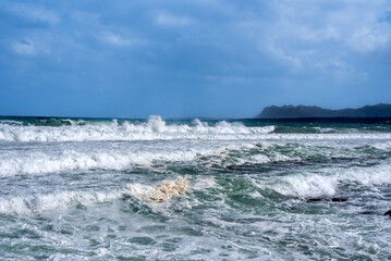 Sea waves summer day, clouds on horizon landscape.