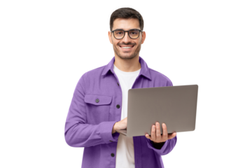 Studio portrait of young man standing holding laptop and looking at camera with happy smile
