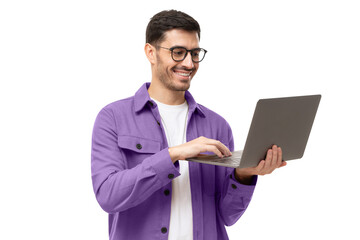 Young modern businessman wearing casual shirt, standing with open laptop in hands, surfing online - 548614468