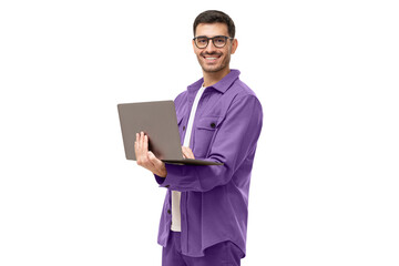 Naklejka na ściany i meble Young man standing holding laptop and looking at camera with happy smile