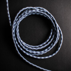 Blue Grey Braided Cable on Black Background
