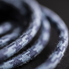 Blue Grey Braided Cable on Black Background