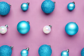 Composition with Christmas balls on lilac background