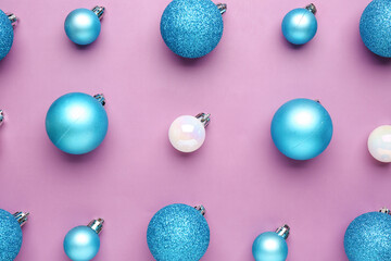 Composition with Christmas balls on lilac background
