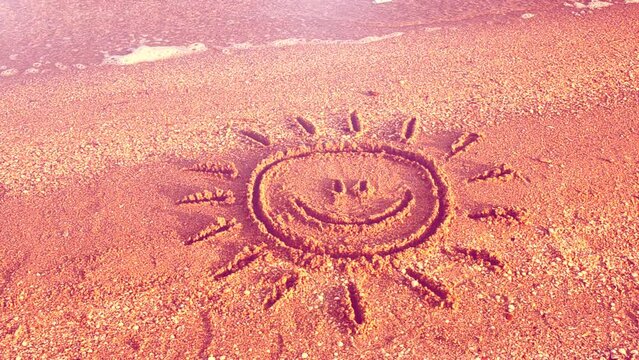 Beach and drawing. Sun drawing on the beach.