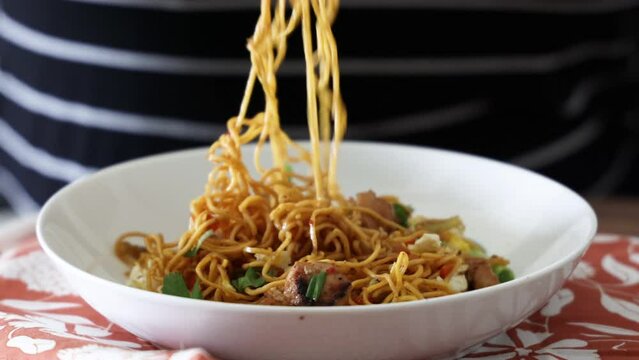 Eating a Bowl of Mee Goreng