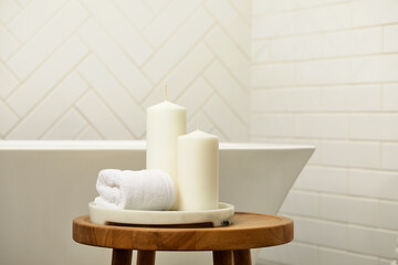 White Bathroom With Wooden Table, Marble Tray, White Candles And Face Towel. Bath Tab