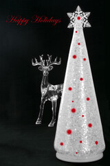 Glass deer and white tree