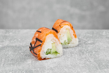 japanese sushi rolls close-up on a gray background