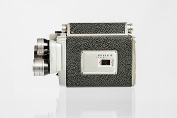 8mm Movie Camera. Vintage old video camera isolated on white
