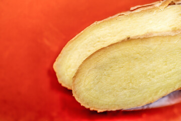 Two slices of fresh ginger
