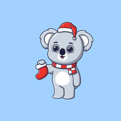 cute koala holding christmas socks