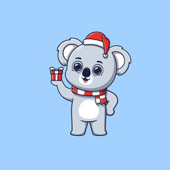 cute koala holding small christmas gift