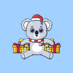 cute koala sitting in front of christmas gifts