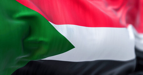 Close-up view of the Sudan national flag waving in the wind
