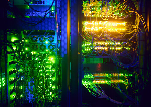 Illuminated network cables in server room