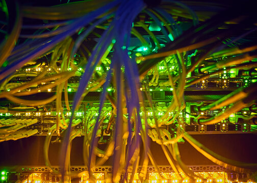 Illuminated network cables in server room